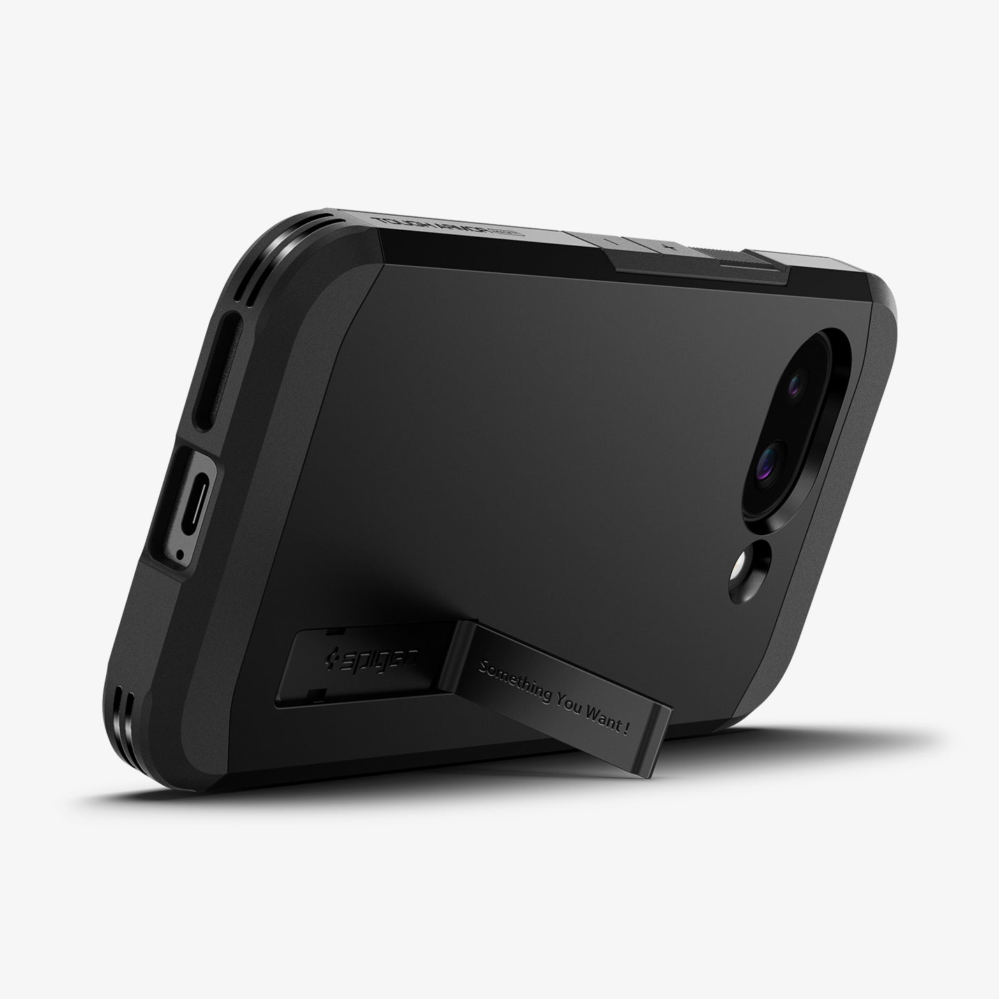 ACS09046 - Pixel 9a Case Tough Armor AI (MagFit) in Black showing the back, partial side and bottom, propped up with a built-in kickstand