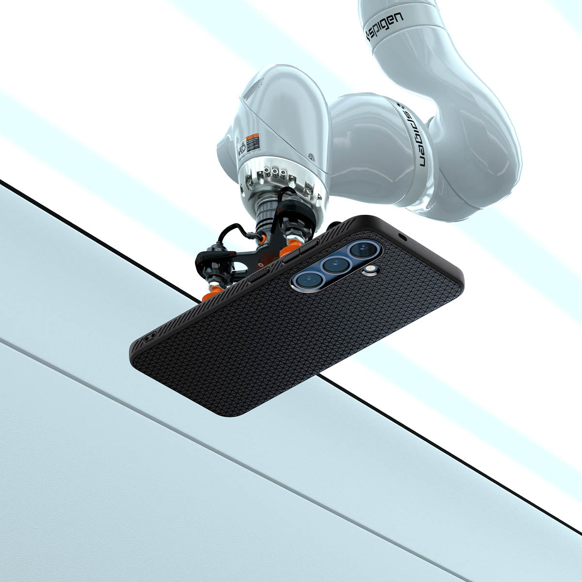 ACS08979 - Galaxy S25 Plus Case Liquid Air in Matte Black showing the
robotic arm holding the device in an elevated horizontal position, angled slightly upward. Showing the device back facing outward, revealing its camera module. The robotic arm is positioned above a clean, structured background with defined panels