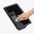 ACP10638 - Model Y Juniper (2025+) 1PK Underseat Organizer Box | TO222J showing wipe inside with the hand