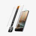 AGL11068 - Galaxy S26 Ultra GLAS.tR EZ Fit Pro showing the installation tray hovering above the screen protector and the device