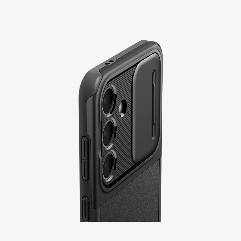 ACS07363 - Galaxy S24 Case Optik Armor in Black showing the back, partial side and top, half bodied, camera cover, slide open, zoomed in