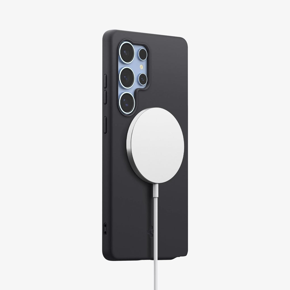 ACS09017 - Galaxy S25 Ultra Case Silicone Fit (MagFit + Qi2 Ready) in Black showing the partial back and partial side with magsafe charger attached