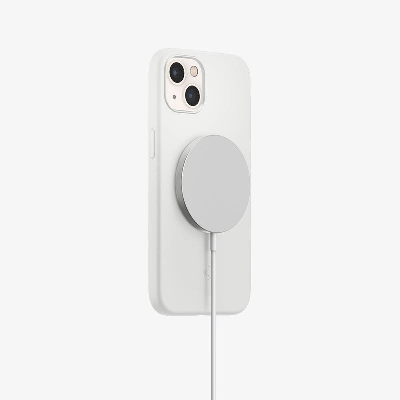 ACS04090 - iPhone 13 Case Silicone Fit MagSafe Compatible in white showing the back and partial side with mag charger connected