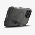 ACS08502 - iPhone 16 Pro Max Case Tough Armor AI (MagFit) in Frost Black showing the back, partial side and bottom with built-in kickstand propped up