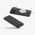 ACS06738 - iPhone 15 Pro Case Optik Armor (MagFit) in black showing the back and sides with magsafe charger connected