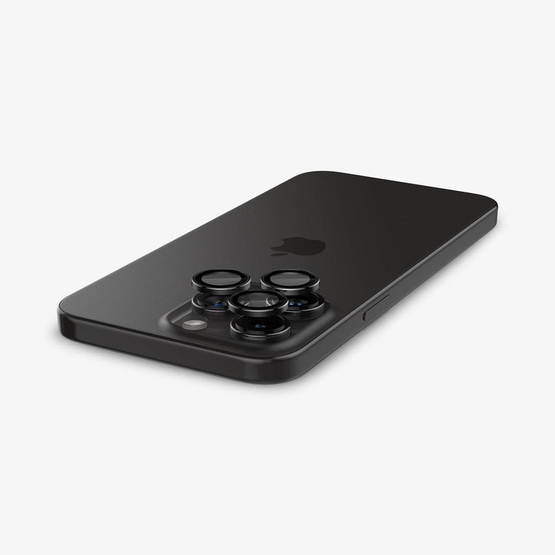 AGL05205 - iPhone 16 Pro / 16 Pro Max Optik Pro Lens Protector in black showing the back with lens protector hovering above camera lens