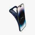 ACS04958 - iPhone 14 Pro Case Liquid Air in navy blue showing the back bending slightly away from device to show the flexibility