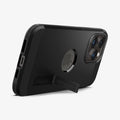 ACS04840 - iPhone 14 Pro Max Case Tough Armor (MagFit) in black showing the device being propped up horizontally by built in kickstand