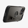 ACS04839 - iPhone 14 Pro Max Case Tough Armor (MagFit) in gunmetal showing the device being propped up horizontally by built in kickstand