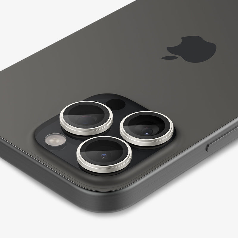 AGL08863 - iPhone 16 Pro Max / iPhone 16 Pro Optik Pro EZ Fit Lens Protector in Bright Silver showing the back, side and top zoomed in on the camera lens