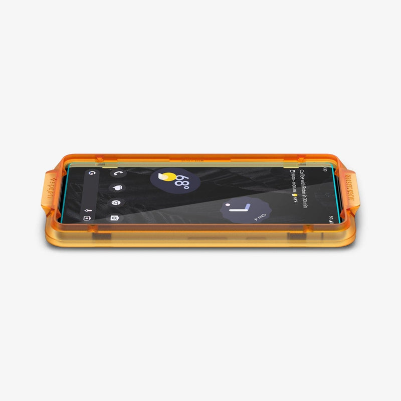 AGL05968 - Pixel 7a Screen Protector AlignMaster GLAS.tR showing the device laying flat and alignment tray installed onto device