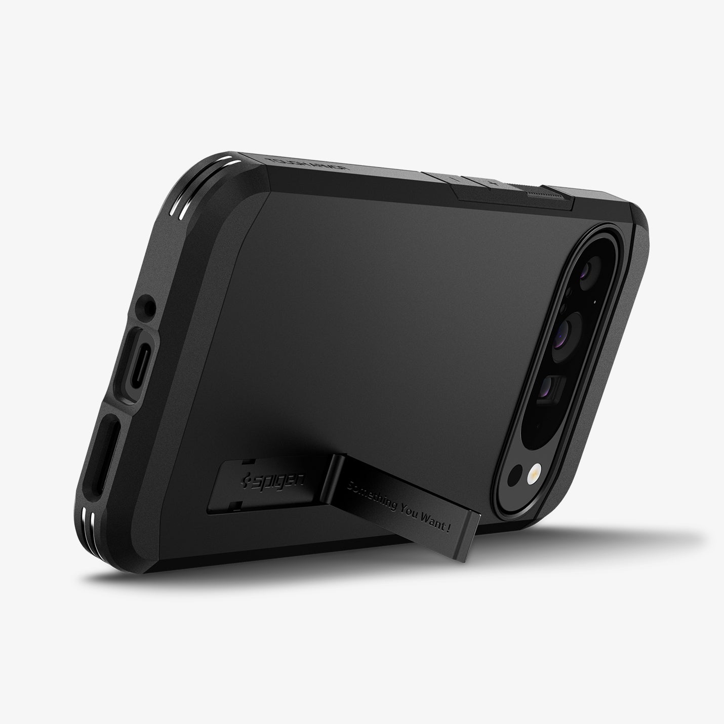 ACS07726 - Pixel 9 Pro XL Case Tough Armor in Black showing the back, partial side and bottom with a propped up built-in kickstand