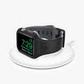 AMP02007 - Apple Watch Series (44mm) Case Liquid Air Pro in black showing the front with watch on wireless charger