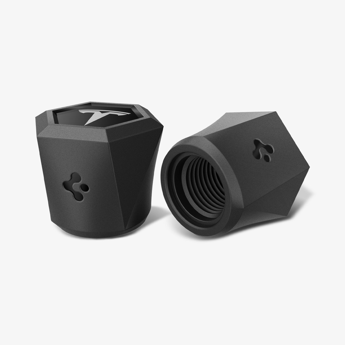 ACP11370 - Universal Tire Valve Stem Cap | VS100TS/R in silver showing two hexagonal caps with Tesla logo, including one upright and one angled to reveal internal threading.
