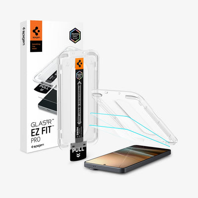 AGL11068 - Galaxy S26 Ultra GLAS.tR EZ Fit Pro showing the installation tray hovering above the 2 screen protector and the device, beside it is another installation tray with case
